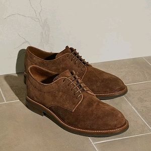 Brown Brunello Cucinelli shoes.
